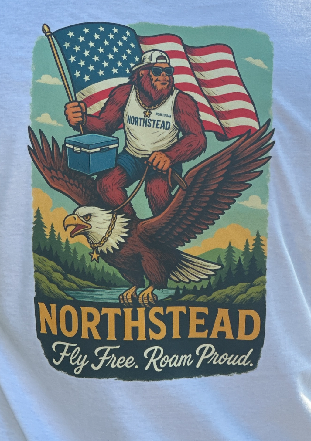 T-shirt design with a sasquatch, american eagle, old school cooler, and american flag. 